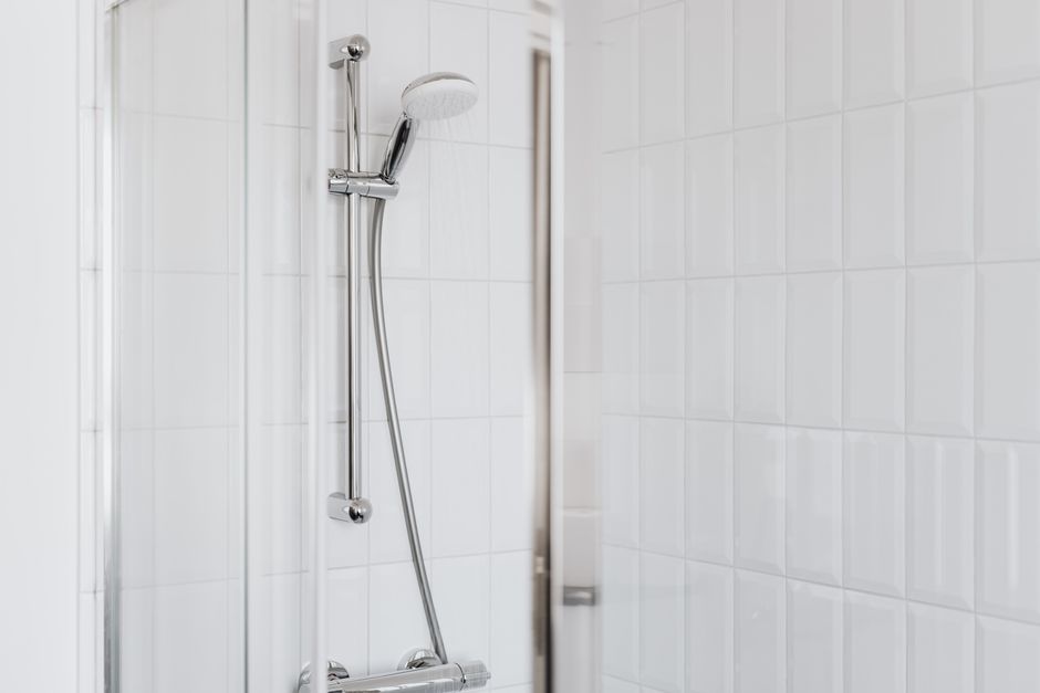 Fully tiled wet room completed by bathroom installers in Crosby, Merseyside